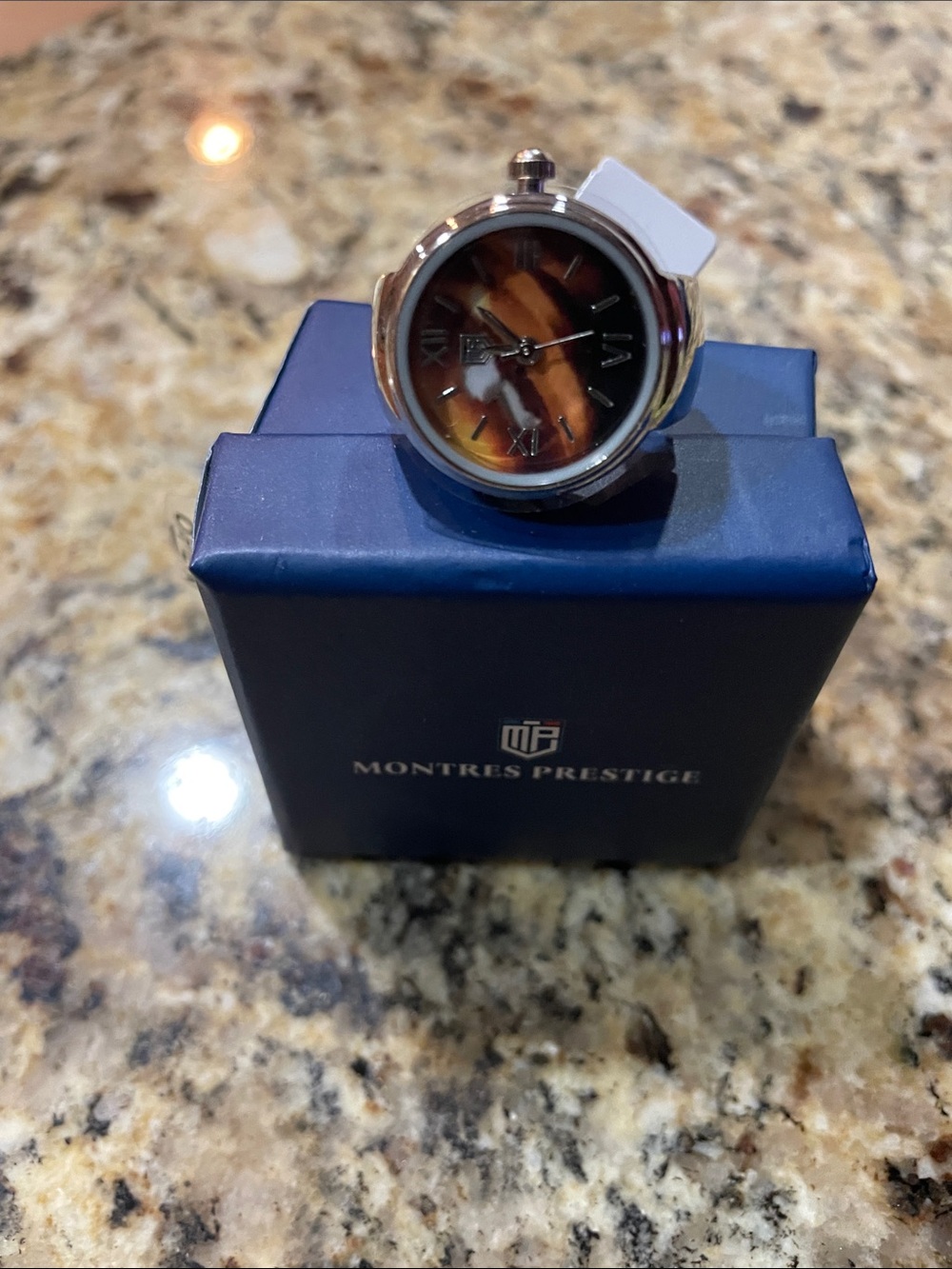 Montres Prestige Women's Silver Ring Watch with Brown Tortoiseshell Dial